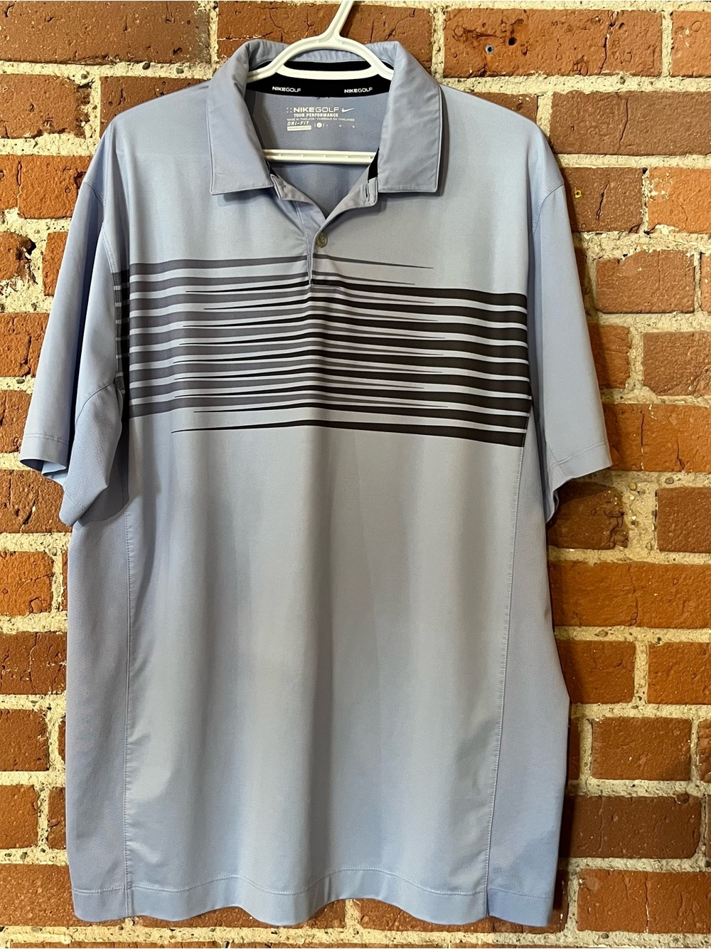 Nike Light Blue Polo with Black Horizontal Stripe Design